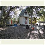 Shower is in the left with the red door