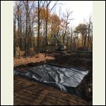 Landscape fabric under the driveway